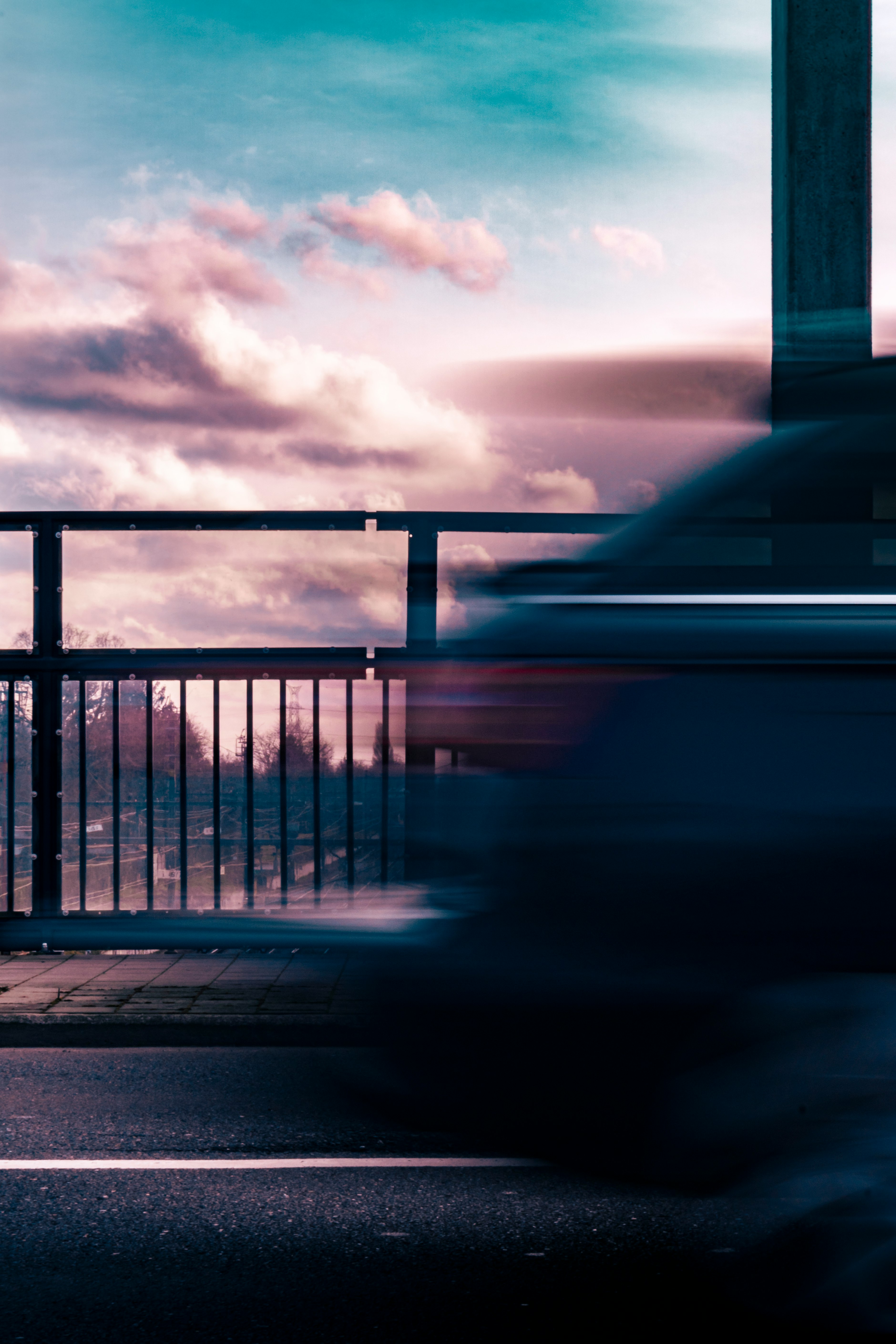 grayscale photo of a car on a road